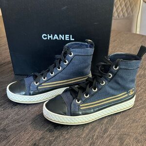 CHANEL Black and Gold High-Top Sneakers